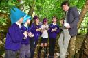 BeWILDerwood creator and author Tom Blofeld with pupils from Norwich Primary Academy. From left, Jack Ward, eight, Randall Waller, eight, Rebecca Leader, nine, Melissa Weldon, eight, and Chloe Coulsey, nine. Picture: ANTONY KELLY