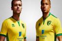 Norwich City’s Jonny Howson (left) and Martin Olsson (right) model the new kit. Photo: Norwich City