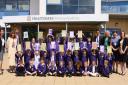 Children and staff from Heartsease Primary Academy celebrate their outstanding Ofsted. Picture: DENISE BRADLEY