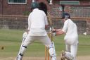 North Elmhams Adam Hint shows how to open the innings in their clash against Northwold. Photo: Mike Wyatt