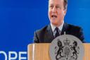 British Prime Minister David Cameron addresses the media after an EU summit in Brussels on Friday, Dec. 18, 2015. European Union leaders are reconvening in Brussels for the final day of their year-end summit with a wide-ranging agenda including how to bui