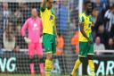 The Norwich players look dejected after conceding their sides 3rd goal during the Barclays Premier League match at St. James's Park, Newcastle. Picture by Paul Chesterton/Focus Images Ltd