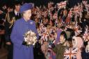 The Queen arrives at RAF Marham and is welcomed by local school children. Date 24 Jan 1996