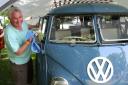 Ed Ewing from Blakeney-based hire company Groovy Campers gives a camper van a polish ready at a previous Dubs at the Hall festival. Picture: KAREN BETHELL.