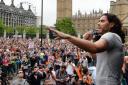 Russell Brand speaks at the End Austerity Now rally in Parliament Square, London. Photo: John Stillwell/PA Wire
