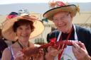 Crab and Lobster Festival presidents Hilary Cox and Noel Gant with a couple of crustaceans. Picture: Karen Bethell