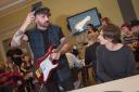 Mike duce of Lower Than Atlantis teaching during the guitar workshop at BBC Radio 1's Academy - Paul Bayfield