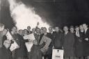 Money to burn: amusement arcade owners protesting against a tax celebrate in front of the flaming bonfire of gaming machines on November 5th 1969 Picture: Mercury library