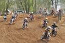 Action from the Norfolk & Suffolk Junior Motorcycle Club Easter weekend meeting at Great Hockham - pictured in the 65cc class (7-10 years) start of racing Cullen Hawkins (65) hitting the deck and Rupert Graver (123), Alfie Jones (11), Harvey Russell (4), 