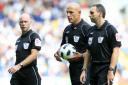 Norfolk refereeing assistant Darren Cann (right) with referee Howard Webb (centre) and fellow assistant Michael Mullarkey, the same trio who officiated in the 2010 Fifa World Cup final. Picture: Nick Potts/PA