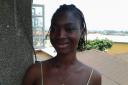 Hoping for a bright future, Tenneh Cole, 22, at home in Freetown.