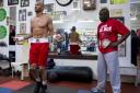 Former Norwich City striker Leon MzKenzie works out under the watchful gaze of Dad Clinton ahead of his professional boxing debut at the York Hall on June 29. Picture by Alex Broadway/Focus Images Ltd