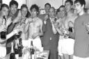 The bubbly is flowing as Town celebrate winning the Second Division championship in 1968. Manager Bill McGarry is in the centre of the picture