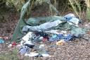 Fly-tipping in woods near Foxhall Stadium in Ipswich