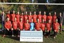 Loddon United first team with sponsors Simon McIntyre (back row right) and Neil Russell (back row left) of Musker McIntyre Picture: Loddon United FC