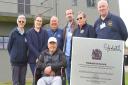 100th Bomb Group Memorial Museum volunteers with former US airman Albert Freitas and Queen’s Award for Voluntary Service certificate (inset)