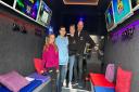Philip and Dee Radley with their children Nikola and Miko in the Kings of Games truck