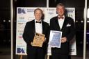 Gareth Miller (left), CEO of Cornwall Insight, with Tim Seeley of Barclays, sponsor of the Outstanding Achievement award at the Norfolk Business Awards 2022