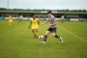 Dereham Town in action against Shepshed Dynamo