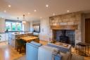 A multi-purpose, tailor-made country kitchen designed by MIDA Interiors Limited