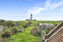 The cottage boasts amazing views of Happisburgh Lighthouse