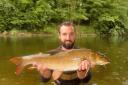Will holds a golden Wye barbel