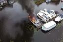 Drone footage showing a boat fire on the Norfolk Broads