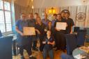 The Wells Crab House team celebrates being named England best restaurant and seafood establishment
