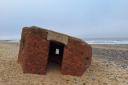 A pillbox has been unearthed at East Runton beach
