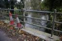 A flood warning is still in place for part of Norfolk after heavy rain