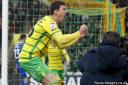 Christian Fassnacht enjoys the moment with Norwich City fans after netting their fourth of the afternoon