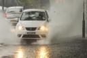Heavy rain has left Norfolk's roads dangerous to travel on