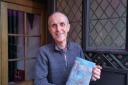 Paul Dickson with the C J Sansom’s book Tombland which inspired a walk telling the story of Kett’s Rebellion…and more
