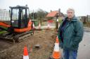 Happisburgh's Bryony Nierop-Reading, known as Granny Canute, has sacrificed another chunk of her garden to the district council to save the village’s clifftop Beach Road car park from being cut-off by erosion