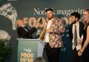 left to right, last year’s host Karl Minns on stage with Edd Watkinson and Jude Porter from The Bodega, which won Best Newcomer, and Hannah Winter (award sponsor - Bread Source)