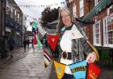 Caroline Topping excited about the Beccles bunting world record attempt, with some of the bunting up around the town.
