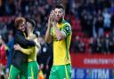 Grant Hanley thanks the Norwich fans at Charlton after Sunday's FA Cup win