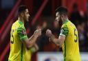 Ozan Kabak, left, and Grant Hanley celebrate Norwich City's win at Charlton