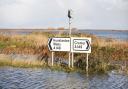 The main road through Cley was closed because of flooding. Picture: Ian Burt