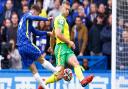 Norwich City will make at least one enforced change with Ben Gibson suspended for Leeds after his red card at Chelsea