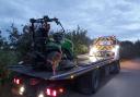 The compact tractor on the transport vehicle