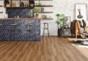 Luxury vinyl tiles (LVT) are a great alternative to solid wood with a protective layer for added durability