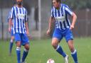 Former Norwich City footballers Simon Lappin and Grant Holt in action for Wroxham