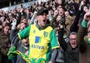 The expression says it all, as a Norwich City fan laps up their dramatic derby climax against Ipswich Town at Carrow Road. Picture: Paul Chesterton/Focus Images