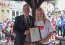Former mayor Gary Bull pictured presenting England football star Lauren Hemp with an honorary award