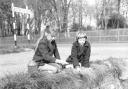 Two girls pictured Caister in April 1961, where they seem to be catching tadpoles or other aquatic wildlife.