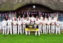 Players from Grimston and the Lee Calton XI before the match got under way at Grimston