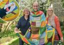Sally-Anne Lomas, creative director and founder of the Cloth of Kindness, with Gill Perks, project manager, and the Reverend Richard Stanton, priest director of the Julian shrine