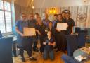 The Wells Crab House team celebrates being named England best restaurant and seafood establishment