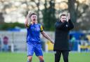 Adam Lakeland and Sam Walker celebrate a big win with Linnets fans